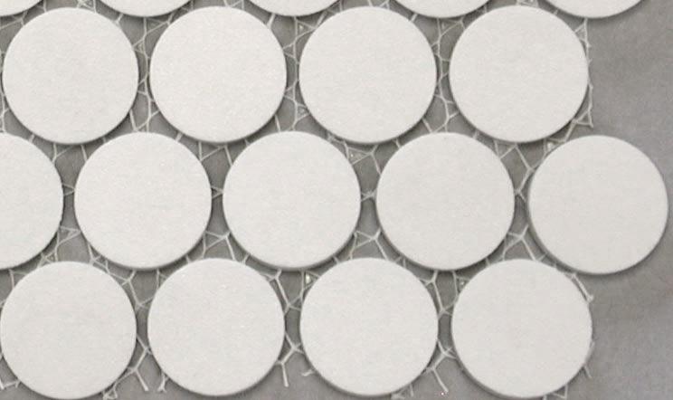 penny round porcelain tile in bone